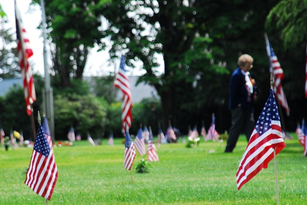 A woman walks the cemetery grounds on Memorial Day.